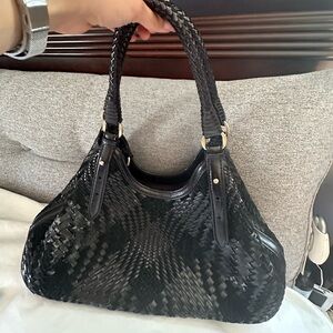 Cale Haan basket weave leather handbag.